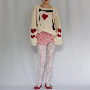 Hand-knitted sweater with coeur-rouge