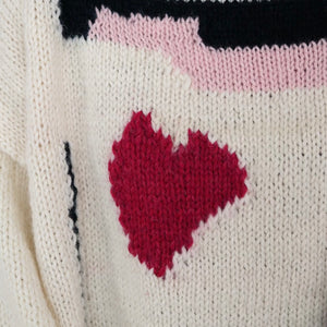 Hand-knitted sweater with coeur-rouge